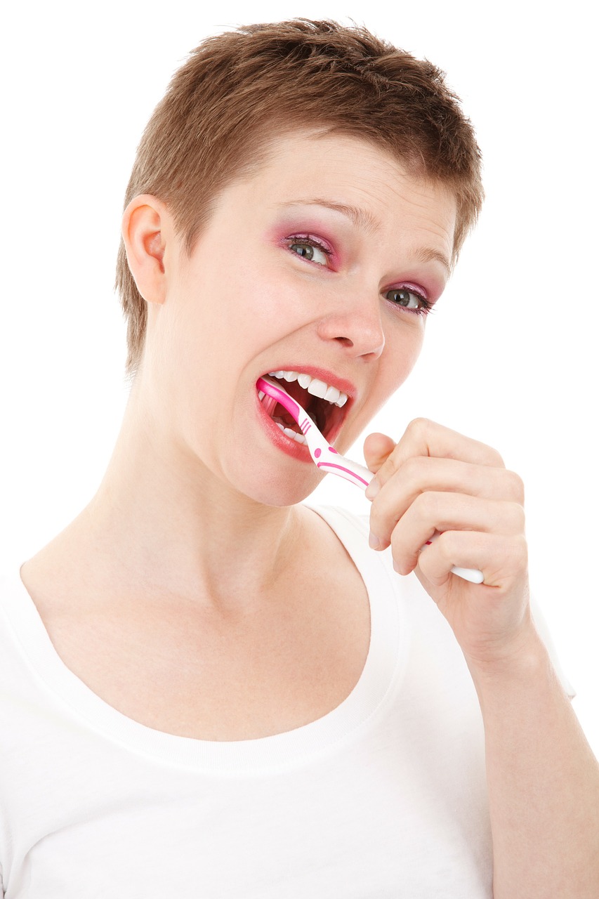 woman brushing teeth